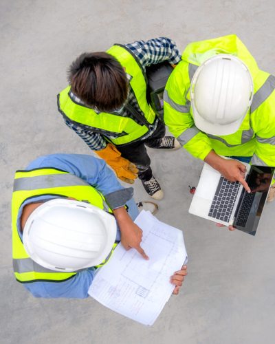 Banner : Civil engineer inspect structure at construction site against blueprint, Building inspector join inspect building structure with civil engineer. Civil engineer hold blueprint inspect building